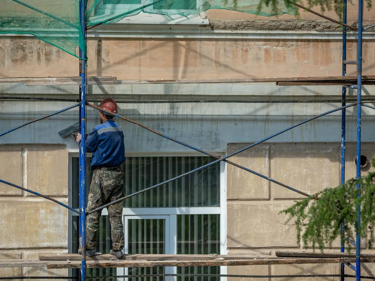 Indicative image of façade repair work from scaffolding. Not a photograph of an SG job.