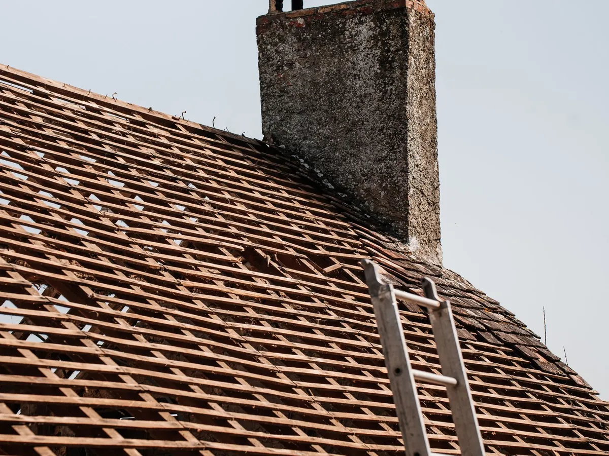 Indicative image of a pitched roof mid-renovation. Not a photograph of an SG job.